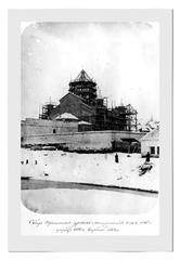 Reconstruction of the Orthodox Cathedral of Theotokos with scaffolding and workers
