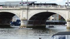 View of boats under the Kingston Bridge on the River Thames in London