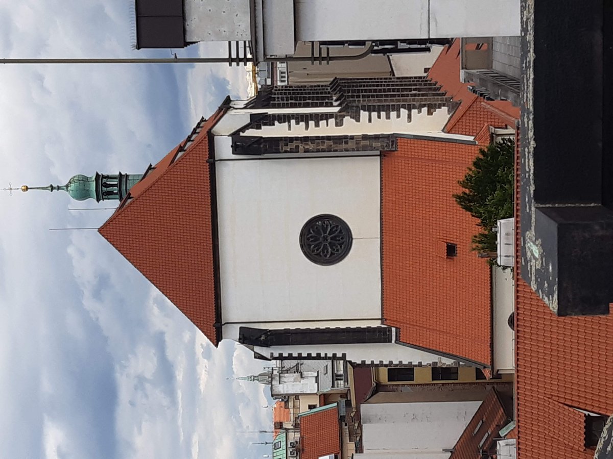 View of Kostel Panny Marie Sněžné church from the roof of Adria Palace in Prague