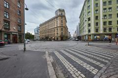 Viiskulma square in Helsinki with colorful buildings and a cloudy sky
