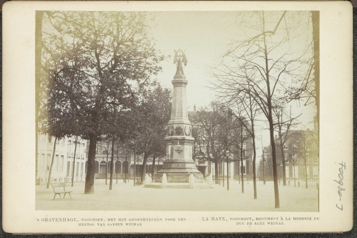 Monument to the Duke of Saxe Weimar at Lange Voorhout in The Hague with figures and street view