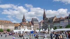 Sunny day at the European Annual Comic Festival in Strasbourg with enthusiastic crowd and colorful banners