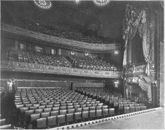 Interior view of the Lyceum Theatre auditorium with red seats and ornate gold decorations