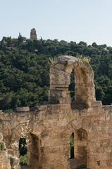 Part of Herodes Atticus theatre wall with Philopappos monument in Athens Greece
