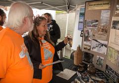 BLM Archaeologist Lisa Rice speaks with Oregon SHPO Archaeologist Dennis Griffin at the 2017 Archaeology Roadshow at Portland State University