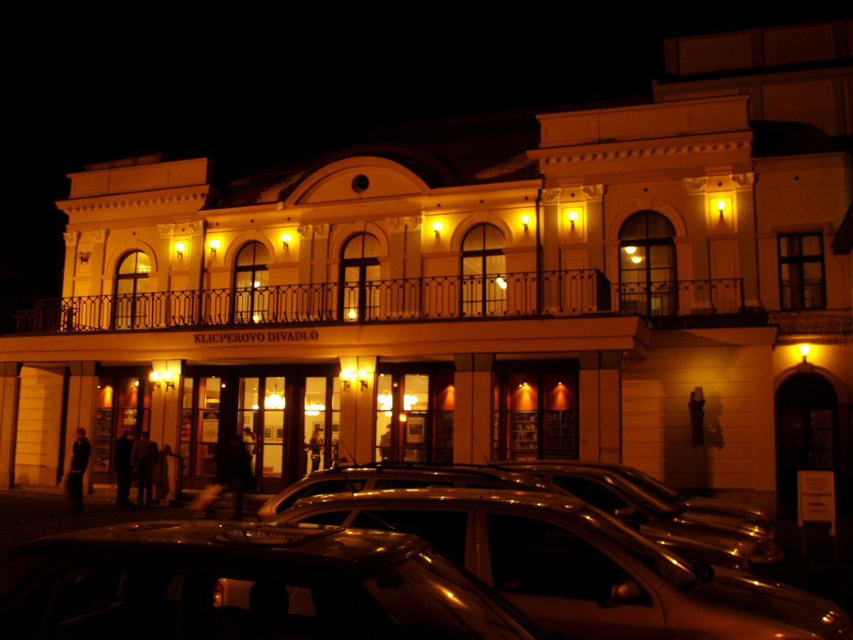 Klicpera Theater building in Hradec Králové with classic architectural design under blue sky