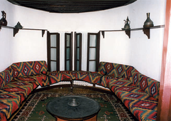 Interior of Divanhana by S. Negovanović showing traditional Ottoman architectural elements and intricate woodwork