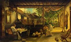Patio interior in Santiago de Cuba with traditional Cuban architecture and lush greenery