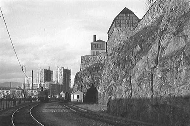Havnebanen railway passing by Akershus Fortress in Oslo, Norway
