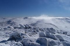 Morning panoramic views from the summit of Mount Kosciuszko in Kosciuszko National Park, New South Wales, Australia
