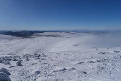 Morning landscape view from the summit of Mount Kosciuszko with mountains and valleys in Kosciuszko National Park, New South Wales