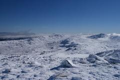 Morning view from Mount Kosciuszko summit overlooking Kosciuszko National Park in New South Wales, Australia