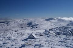 Panoramic morning view from the summit of Mount Kosciuszko in Kosciuszko National Park, New South Wales, Australia