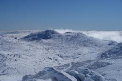 Morning view from Mount Kosciuszko summit with alpine landscape in Kosciuszko National Park