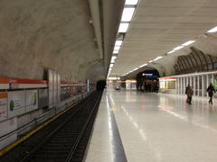 Kamppi metro station platform with passengers and trains, Helsinki