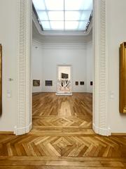 Interior view of a room in the Nantes Museum of Arts featuring Rodin's sculpture 'The Three Shades' in the background, February 2024