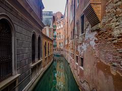 Scenic view of Venice canals with historic buildings and gondolas