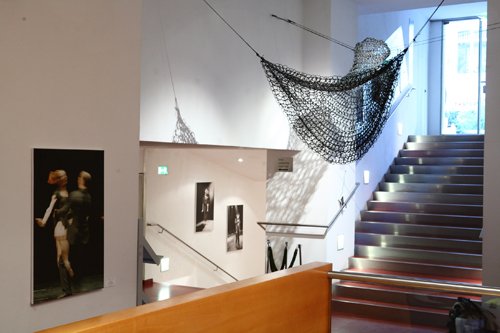 Kosmos Theater foyer with seating and decorative lighting