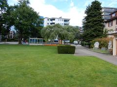 Rusty iron music-themed sculptures along the promenade in Montreux, Switzerland