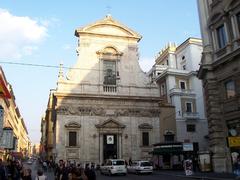 Facade of Chiesa di Santa Maria in Via in Rome on a clear day