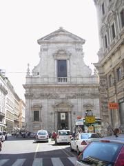 Exterior view of Santa Maria in Via church in Rome, featuring the Madonna del Pozzo statue