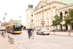 Summer cityscape of Warsaw in July 2023 with modern and historic buildings under blue sky