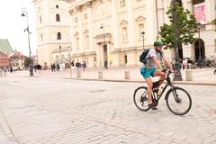 Cityscape of Warsaw during July 2023 showcasing modern buildings and clear sky