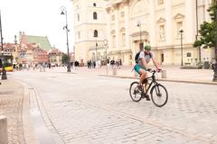 July 2023 cityscape of Warsaw with modern and historic buildings under blue sky
