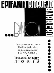 Vintage Ridruejo bank advertisement on a building wall in Berlanga de Duero, Soria