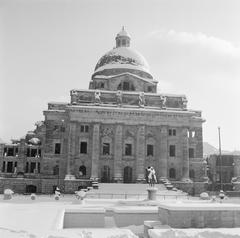 Snow-covered Hofgarten with the ruins of the Bayerische Staatskanzlei in Munich, Germany during winter