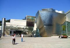 Guggenheim Museum Bilbao exterior with its distinctive titanium curves and reflections