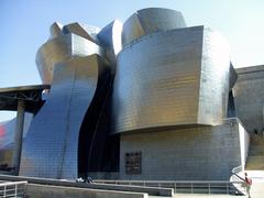 Exterior view of the Museo Guggenheim Bilbao with its unique titanium-clad curves and large glass atrium