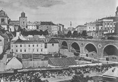 Mariensztat district in Warsaw around 1890 with historical buildings and horse-drawn carriages on cobblestone streets