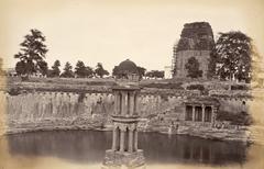 8th century Teli-ka-Mandir temple under restoration with scaffolding and nearby tank at Gwalior Fort, Madhya Pradesh
