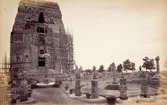 Teli-ka-Mandir temple under restoration with scaffolding and garden sculptures in Gwalior Fort, Madhya Pradesh, circa 1882