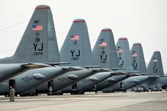 US Air Force C-130 Hercules aircraft on flight line at Yokota Air Base Japan