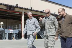 Lt. Gen. Carlton D. Everhart II and Maj. Gen. Frederick Martin talking to Ernie Weber outside WestPac Transportation Facility at Yokota Air Base