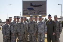 Lt. Gen. Carlton D. Everhart II and Maj. Gen. Frederick Martin with 374th Airlift Wing leadership at Yokota Air Base, Japan, March 26, 2015