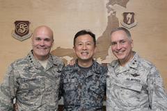 U.S. Air Force and Japan Air Self-Defense Force commanders posing at Yokota Air Base headquarters