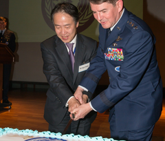 Koji Tomita and Lt. Gen. Jan-Marc Jouas cutting cake at UN Command-Rear cake reception celebrating UN Day 2013