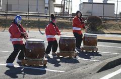 Yokota Taiko Drum line performing for runners during half-marathon at Yokota Air Base