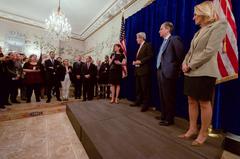 U.S. Ambassador to Belgium Denise Bauer introducing U.S. Secretary of State John Kerry at U.S. Ambassador's Residence in Brussels