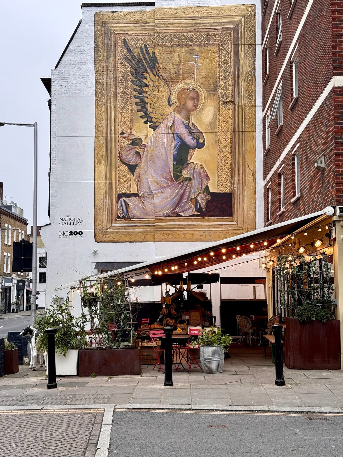 Street artwork mural at the corner of Limerston Street and Fulham Road in London
