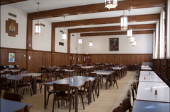 Canada Room dining hall interior with elegant wooden ceiling and chandeliers at St Michael's College University of Toronto