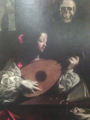 Woman playing a lute in a Baroque painting by Luigi Miradori