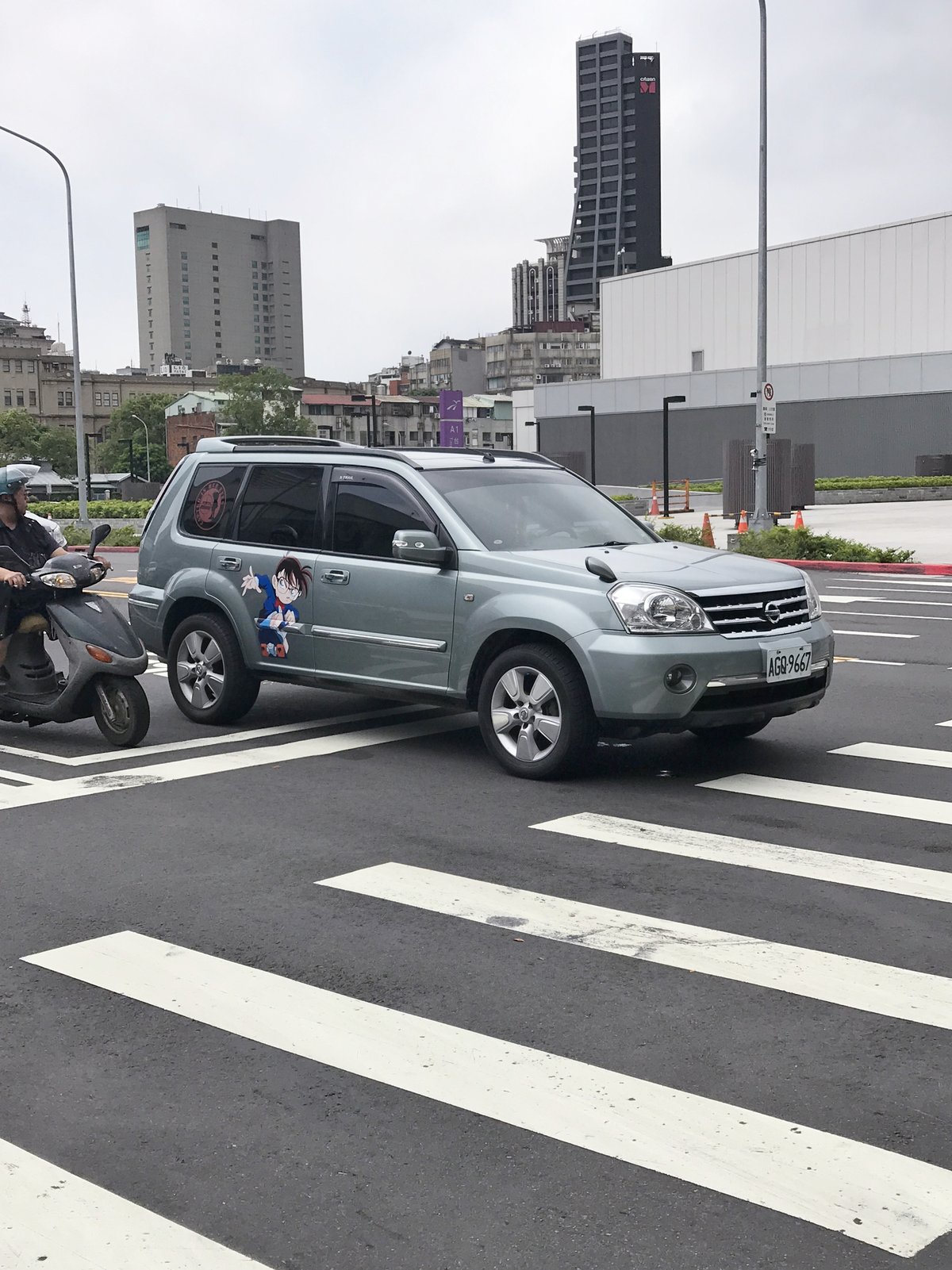 Detective Conan themed Nissan X-Trail Itasha car parked near Taoyuan Metro Taipei Main Station
