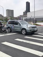 Detective Conan themed Nissan X-Trail Itasha car parked near Taoyuan Metro Taipei Main Station