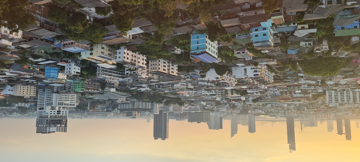 View of Tongtara Riverview Hotel north in Bangkok with Starview Tower B, Canapaya Residences, and Rama IX Bridge in background