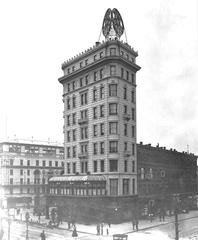 Historic Pabst Hotel building in Manhattan with Hammerstein's Victoria theater marquee showing The Rays in A Hot Old Time, April 1900