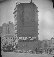 Historic Pabst Hotel on 42nd Street Manhattan with large Pabst Beer logo and slogan on building facade